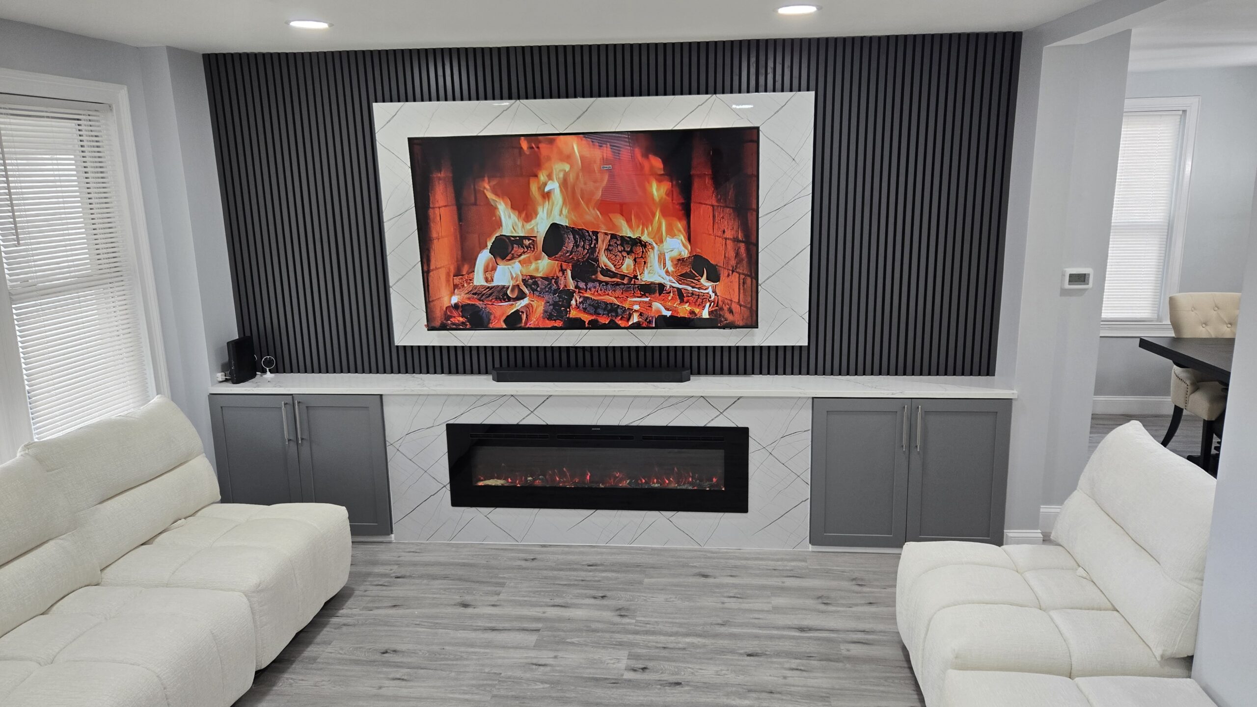 Open concept living and kitchen area after renovation