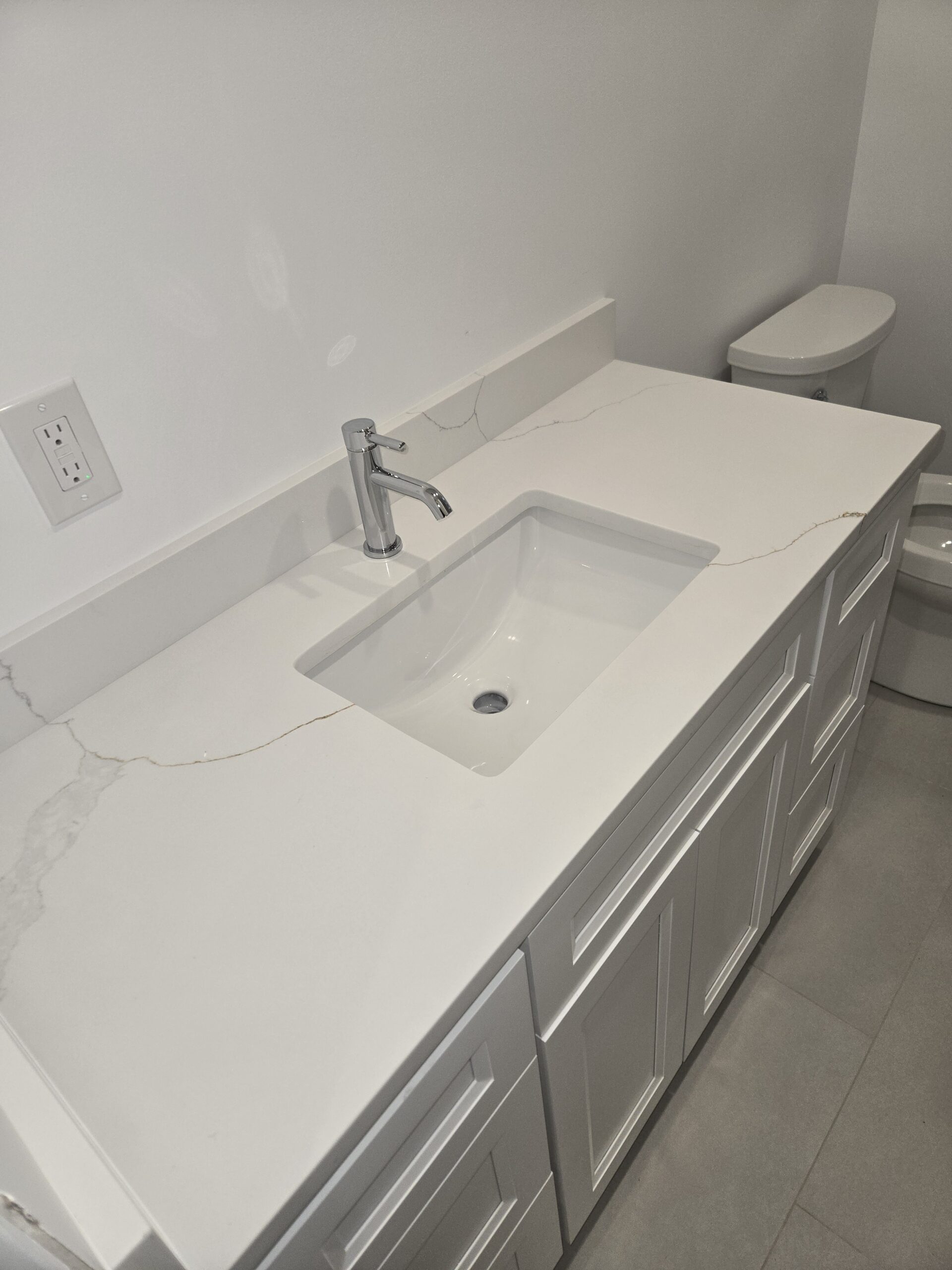 Bathroom remodel with new vanity top and tile work in Bergen County