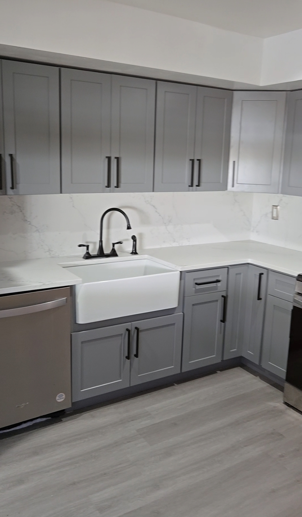 Kitchen renovation project with central island by Delta Renovations in NJ