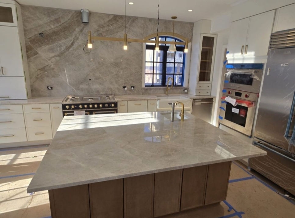 Modern kitchen remodel with stone island and pendant lights in New Jersey